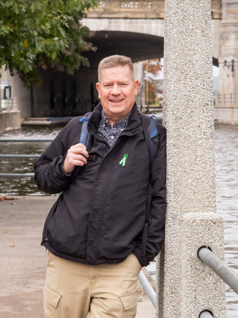 Dave, mature Tourism - Travel Services  student outdoors