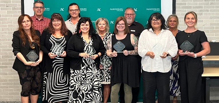 AC Corporate Training and FNIGC staff members gather for a group photo following receiving their awards for their work on the Fundamentals of OCAP® course.