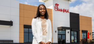 new chick fil a owner standing in front of Kanata restaurant