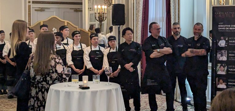 Algonquin College culinary and pastry arts learners pictured with professional chefs at the Chefs at the Castle event. 