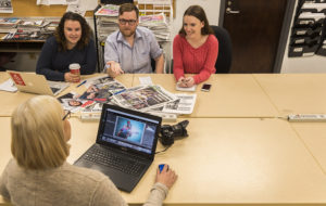 group of students having a production meeting