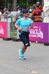 Picture of man running in Ottawa International marathon.
