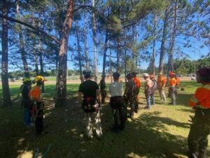 Arborist students get ready to climb trees.