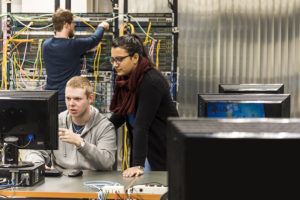 students working in a computer security environment