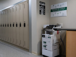 An image of a Ricoh multi function device located on the third floor of the Pembroke campus near the elevator.