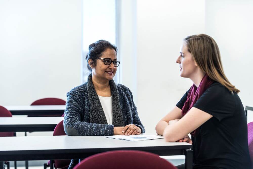 Social Service Worker students roleplaying in the class